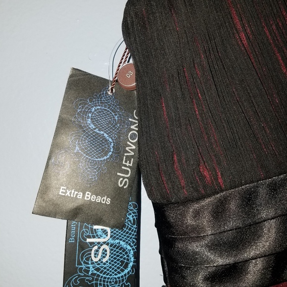 A black cocktail dress by SUEWONG - Picture 4 of 5